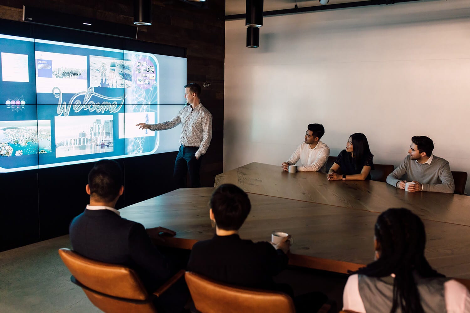 People watching presentation in boardroom