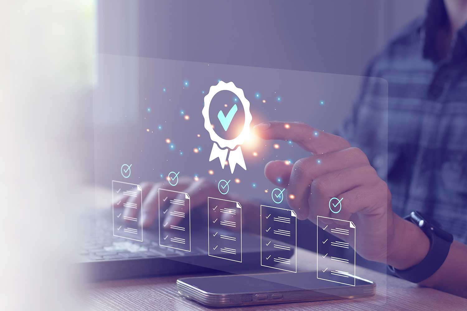 Hands using laptop with quality overlaid representing Why FRS 102 updates are a boardroom issue, not just for the auditors