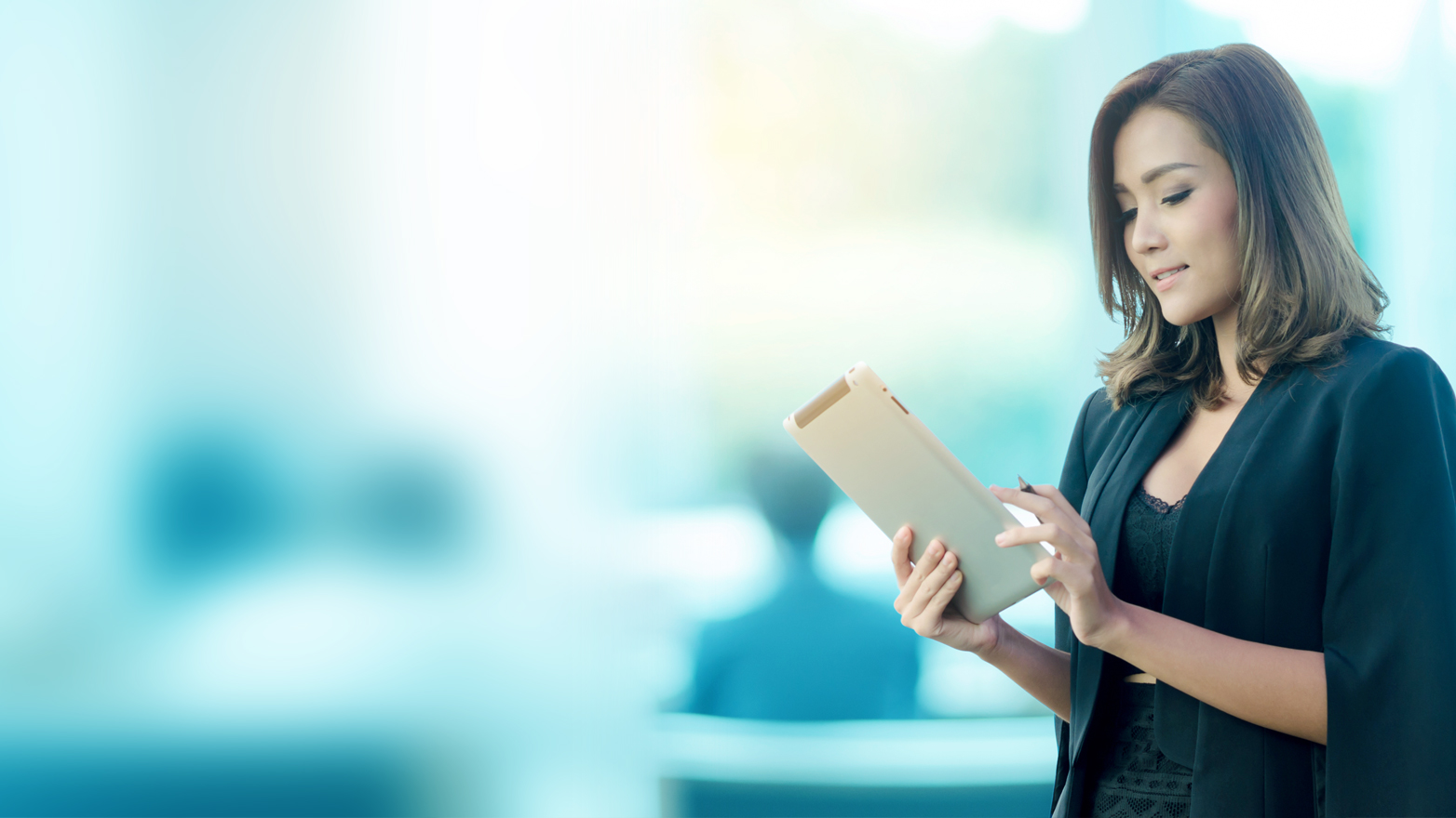 woman regarding clipboard