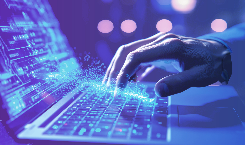 hand on laptop keyboard